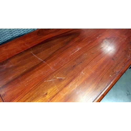 257 - A dark wood stained rustic coffee table with iron fittings and 2 drawers