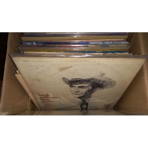 264 - A box of Hank Williams LP's