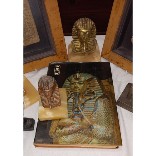 276 - A quantity of Egyptian revival ornaments including framed plaques