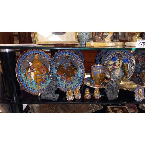 279 - A set of 8 Royal Worcester Legends of the Nile collectors plates, mugs and saucers, etc