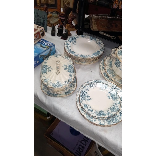 281 - An early 20c dinner set with tureens