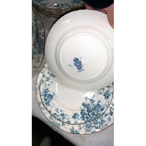 281 - An early 20c dinner set with tureens