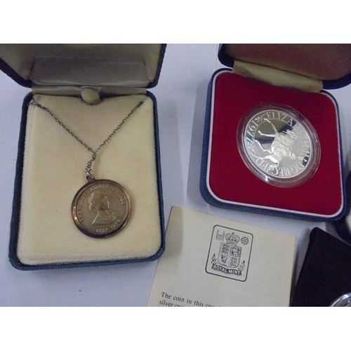 1231 - A Falklands Island sterling silver crown, A Britannia and a 1977 silver proof crowns and a silver pr... 