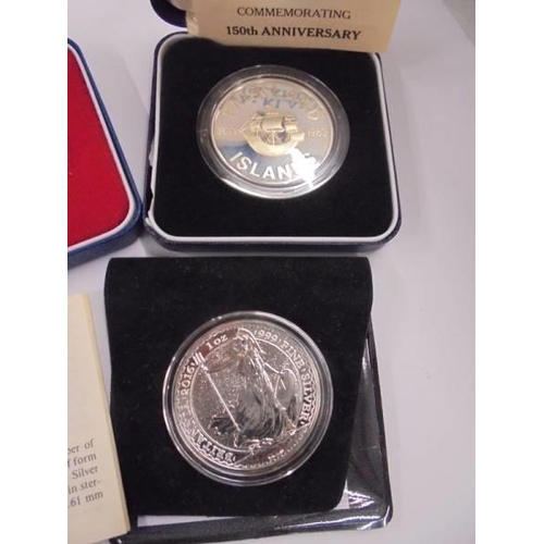 1231 - A Falklands Island sterling silver crown, A Britannia and a 1977 silver proof crowns and a silver pr... 