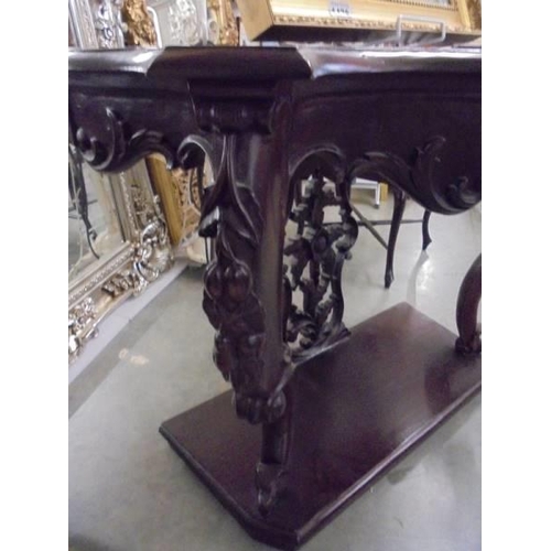 1475 - A mahogany console table. COLLECT ONLY.