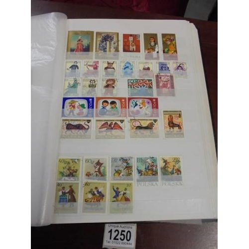 1250 - Two albums of postage stamps.