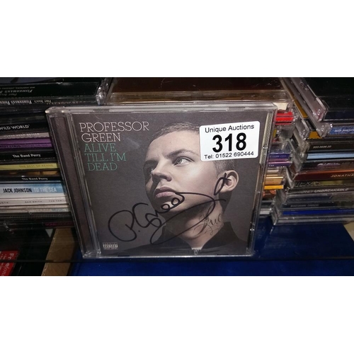 318 - A box of CD's including Sam Smith, Bastille, signed copy by Professor Green                         ... 