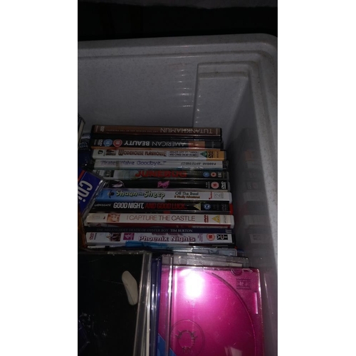 336 - 2 boxes of DVD's & CD's etc.