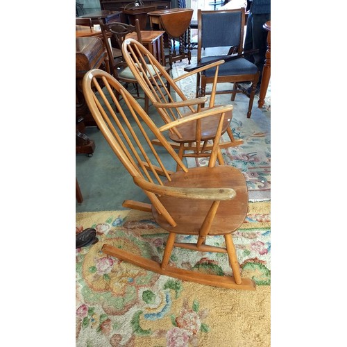 1500 - A pair of low Ercol rocking chairs