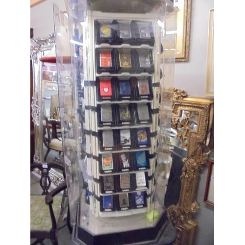 1518 - A Zippo lighters collector's cabinet complete with 100 lighters and magazines. (should revolve but n... 