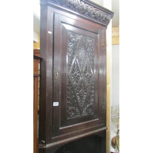 1578 - A carved corner cupboard on stand, COLLECT ONLY.