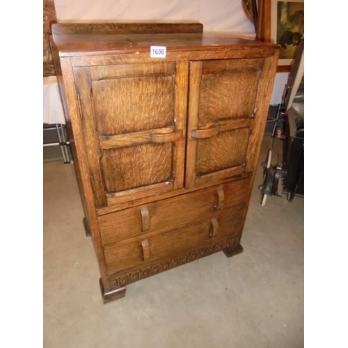 1606 - A two door two drawer cabinet, COLLECT ONLY.