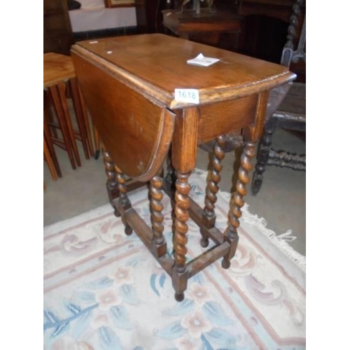 1618 - A small oak barley twist gate leg table. COLLECT ONLY.