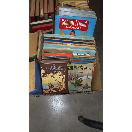 384 - A good lot of children's books including vintage Giles, Enid Blyton, Ladybird etc