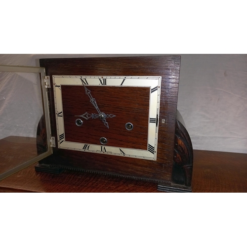 400 - An art deco oak mantle clock