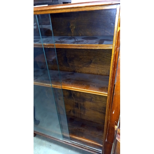 401 - A 1950's oak book case with sliding doors COLLECT ONLY