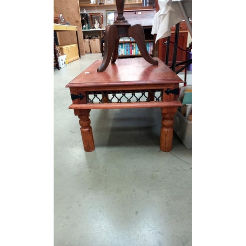 414 - A rustic teak coffee table with iron fittings and 2 drawers COLLECT ONLY