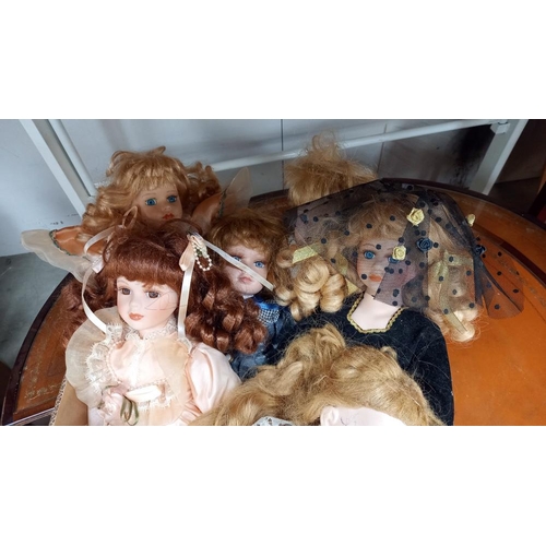 416 - A box of 8 collectors Dolls