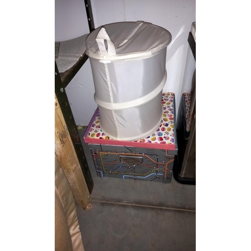 405 - A stainless steel kitchen bin, pine wine rack, London underground collapsible storage box etc