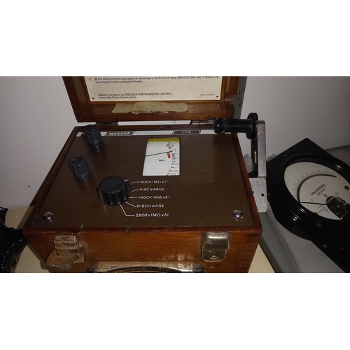 431 - A Record minor insulation tester in a bakelite case and a insulation tester megger type IT5