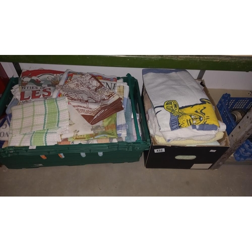 432 - A box of towels and tea towels