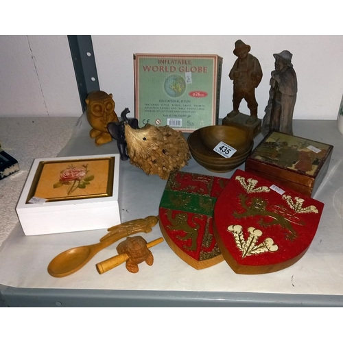 435 - A mixed lot of mainly wooden items including shields