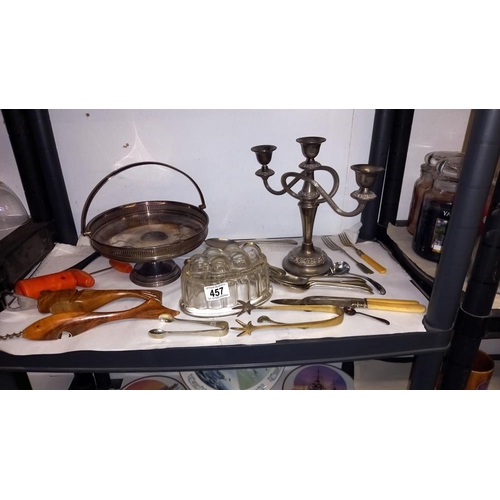 457 - A silver plate candleabra, dish, jelly mould, bottle openers etc