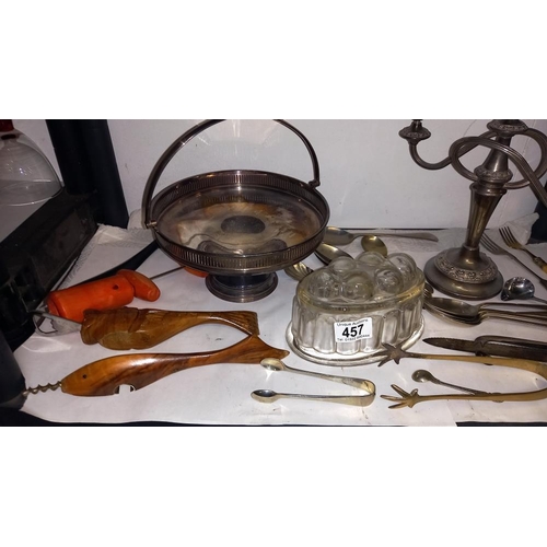 457 - A silver plate candleabra, dish, jelly mould, bottle openers etc