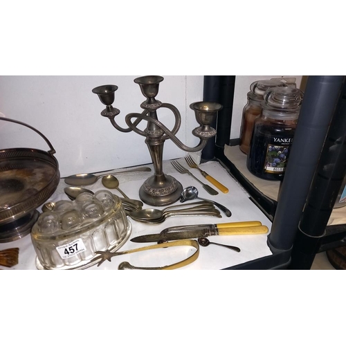 457 - A silver plate candleabra, dish, jelly mould, bottle openers etc