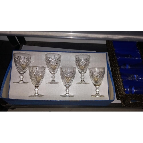 471 - A boxed set of 6 wine glasses, plus 2 more boxes containing 4 glasses in each