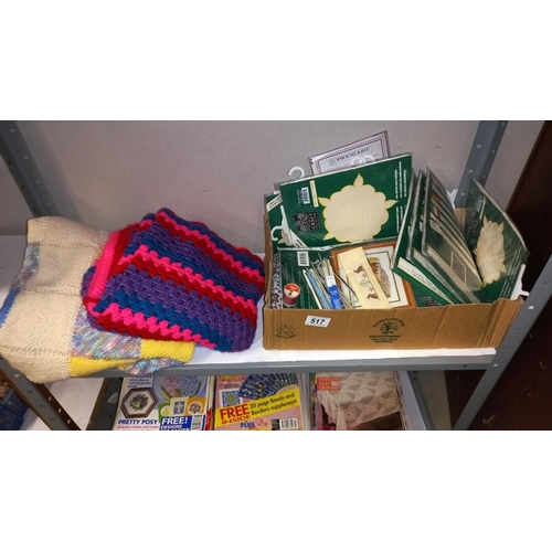 517 - 2 shelves of sewing/knitting/crocheting magazines, plus a knitted blanket, a crocheted blanket, croc... 