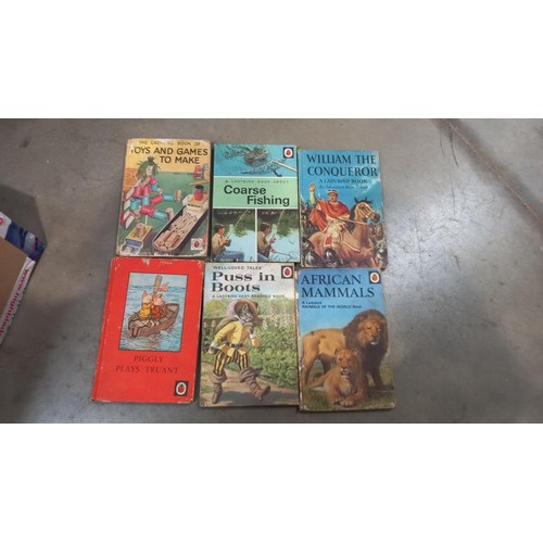 384 - A good lot of children's books including vintage Giles, Enid Blyton, Ladybird etc