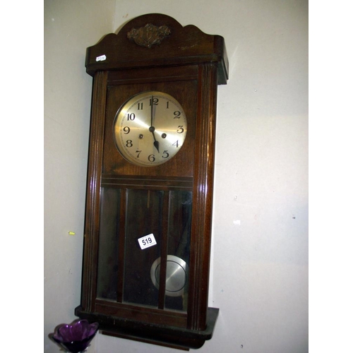 519 - A 1930's oak wall clock - COLLECT ONLY