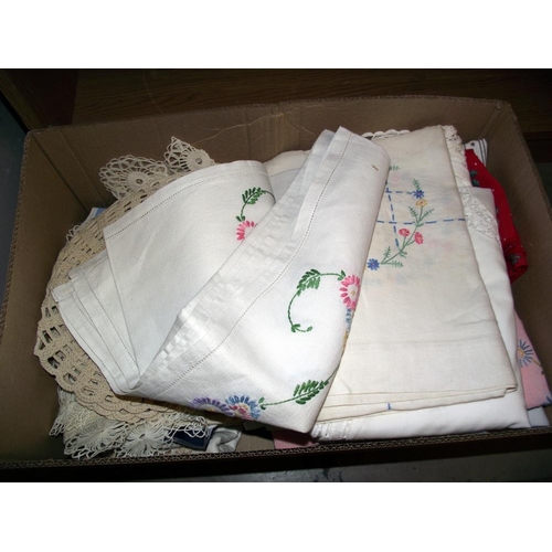 547 - A quantity of tablecloths, doilies etc