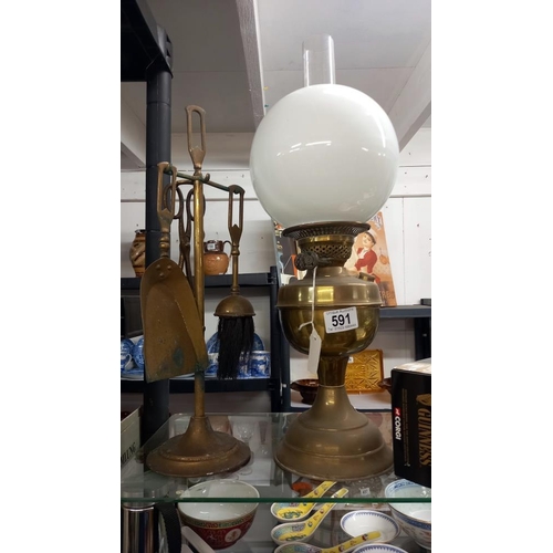 591 - A brass lamp with duplex burner and companion set  COLLECT ONLY