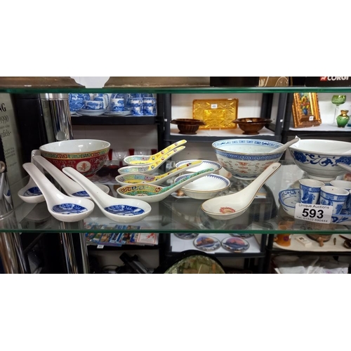 593 - A quantity of Chinese rice/soup bowls and spoons etc