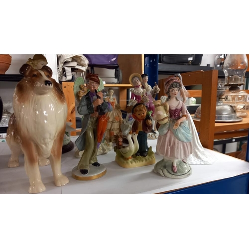 606 - A mixed lot of figures including a collie dog