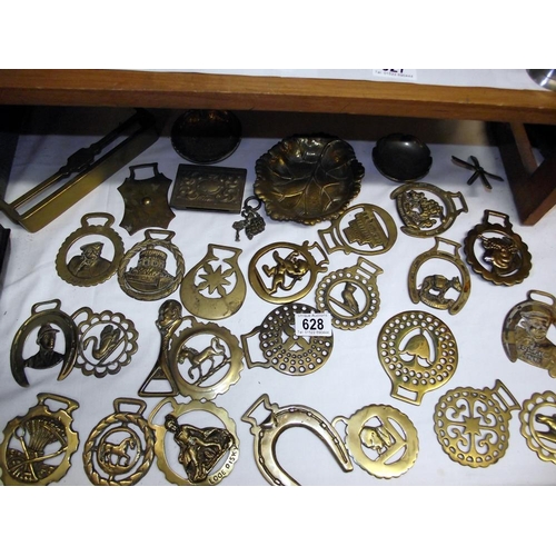 628 - A quantity of horse brasses etc