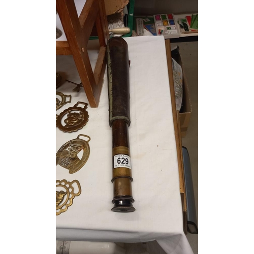 629 - A brass and leather telescope