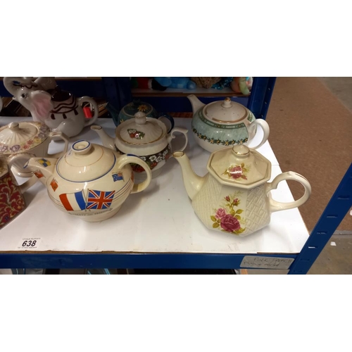 638 - 10 collectors teapots