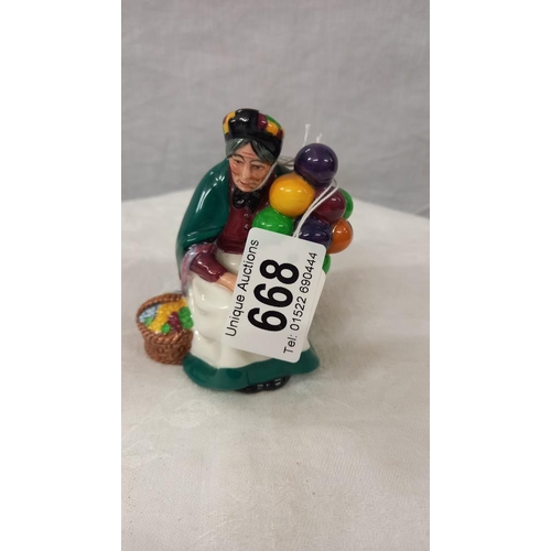 668 - A Royal Doulton small balloon lady