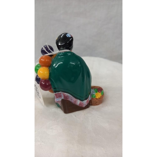 668 - A Royal Doulton small balloon lady