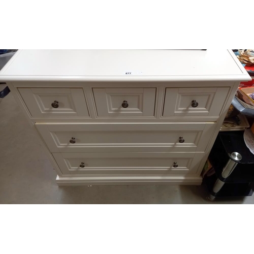 677 - A white 5 drawer chest of drawers