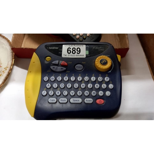 689 - A Brother P-touch 1000 and Brother P-touch 2500 label maker with Brother electric plug