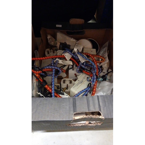 690 - A quantity of extension leads, adapters, box of bungee cords etc