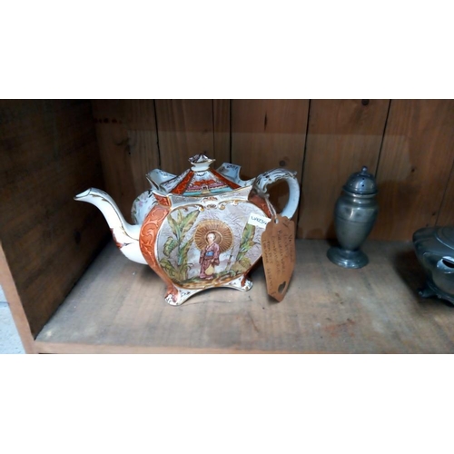 693 - A pewter teapot etc, plus Victorian candlestick, Burleigh ware teapot (teapot a/f)