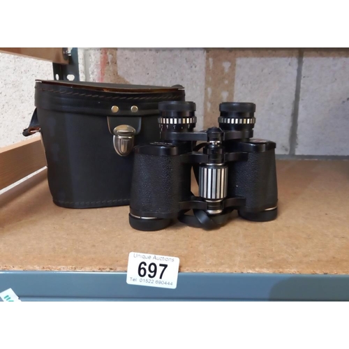 697 - A cased set of Prinzlux 8 x 30 binoculars