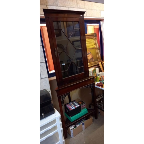 704 - A mahogany astragal glazed corner cabinet on stand, COLLECT ONLY