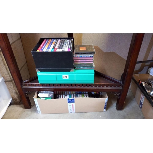 705 - A box of music cassette tapes, box of PC cd games, quantity of cd's etc