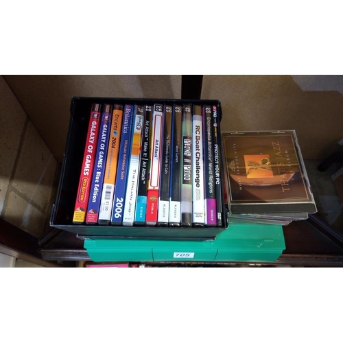 705 - A box of music cassette tapes, box of PC cd games, quantity of cd's etc